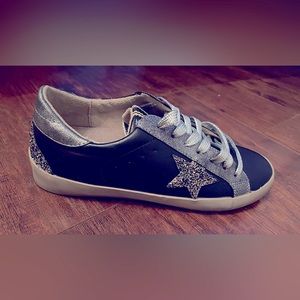 New, never worn, star sneakers.